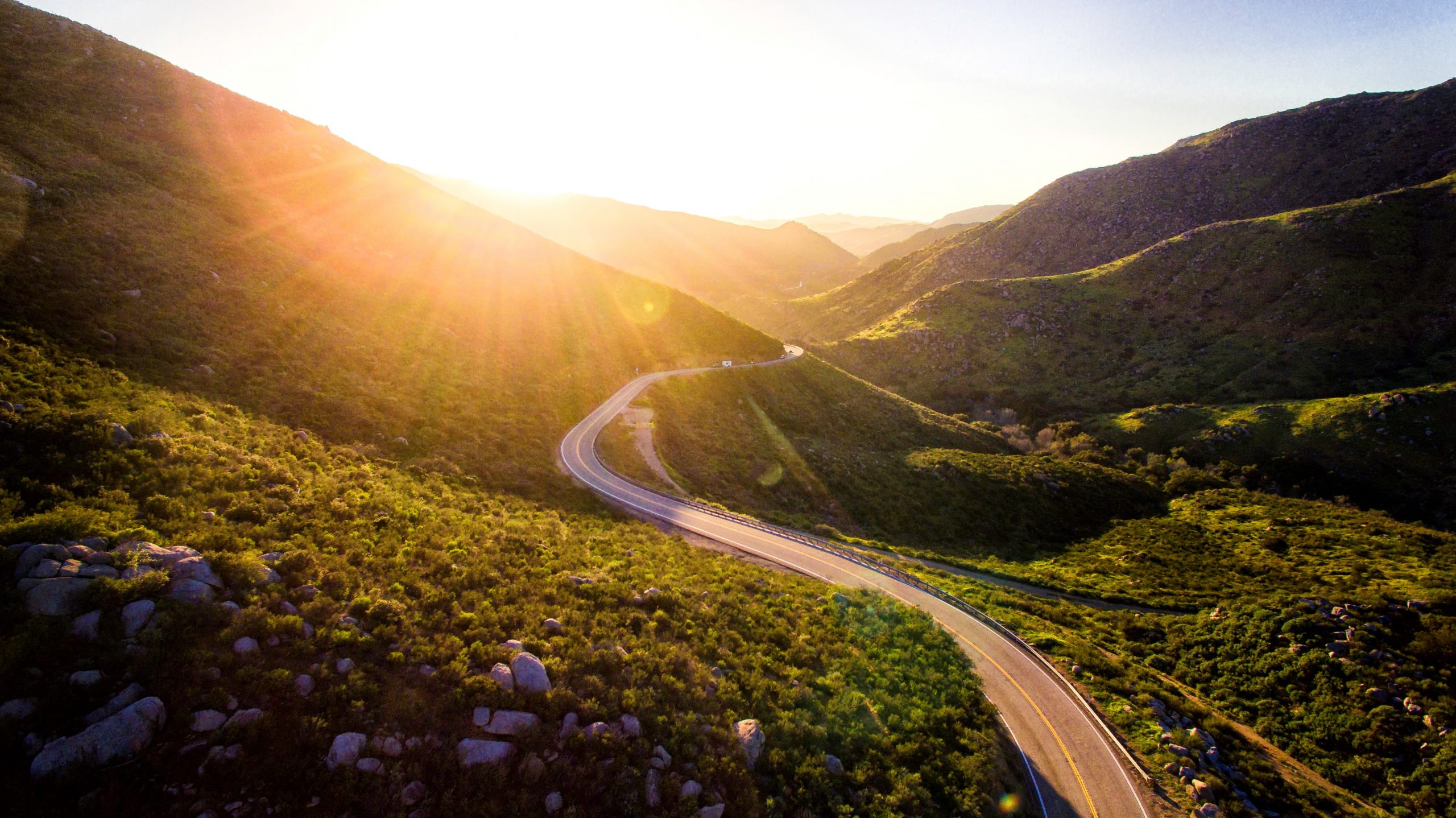 Open mountain road, representing an aligned path forward